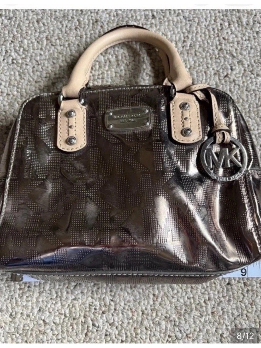 Michael Kors Metallic Silver Mini
Satchel w/Monogram MK Charm - Picture 7 of 10